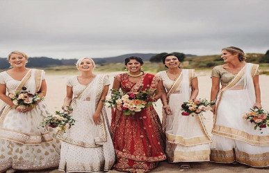Indian bridesmaids on the beach
