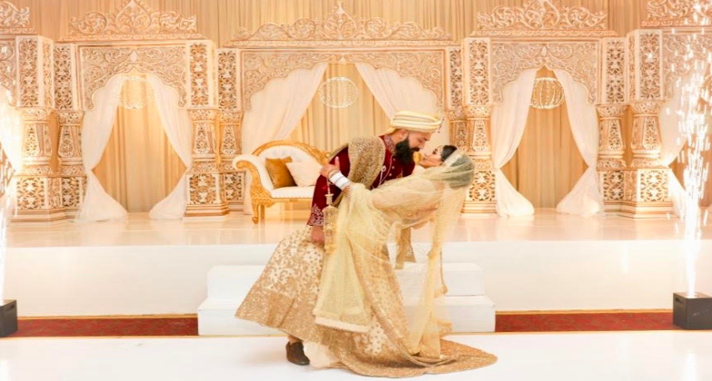 Indian Dance Choreographer_Gulabi Dance Co_bride and groom with the entourage